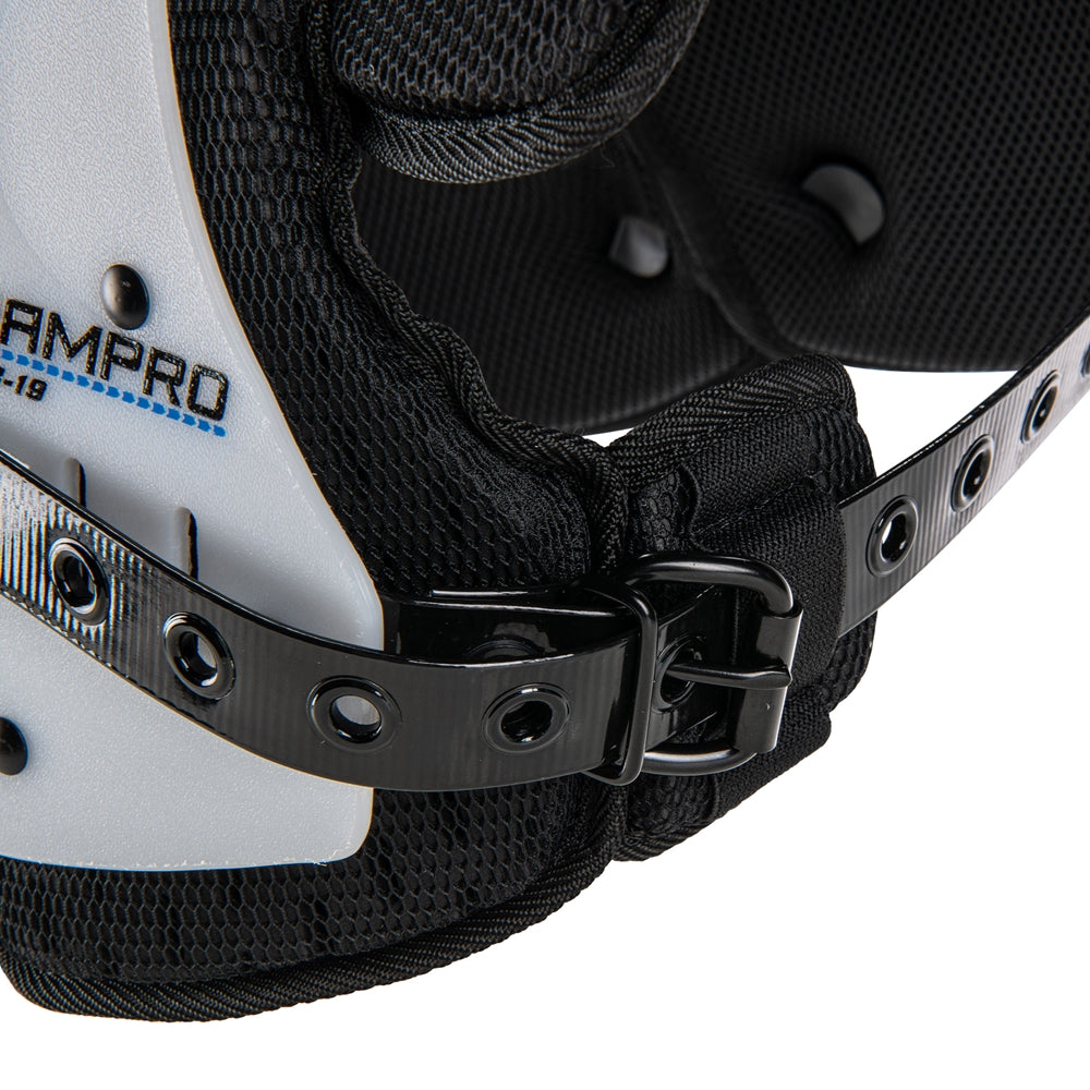 Close-up of a white and black protective gear with 'Champro' branding on a white background