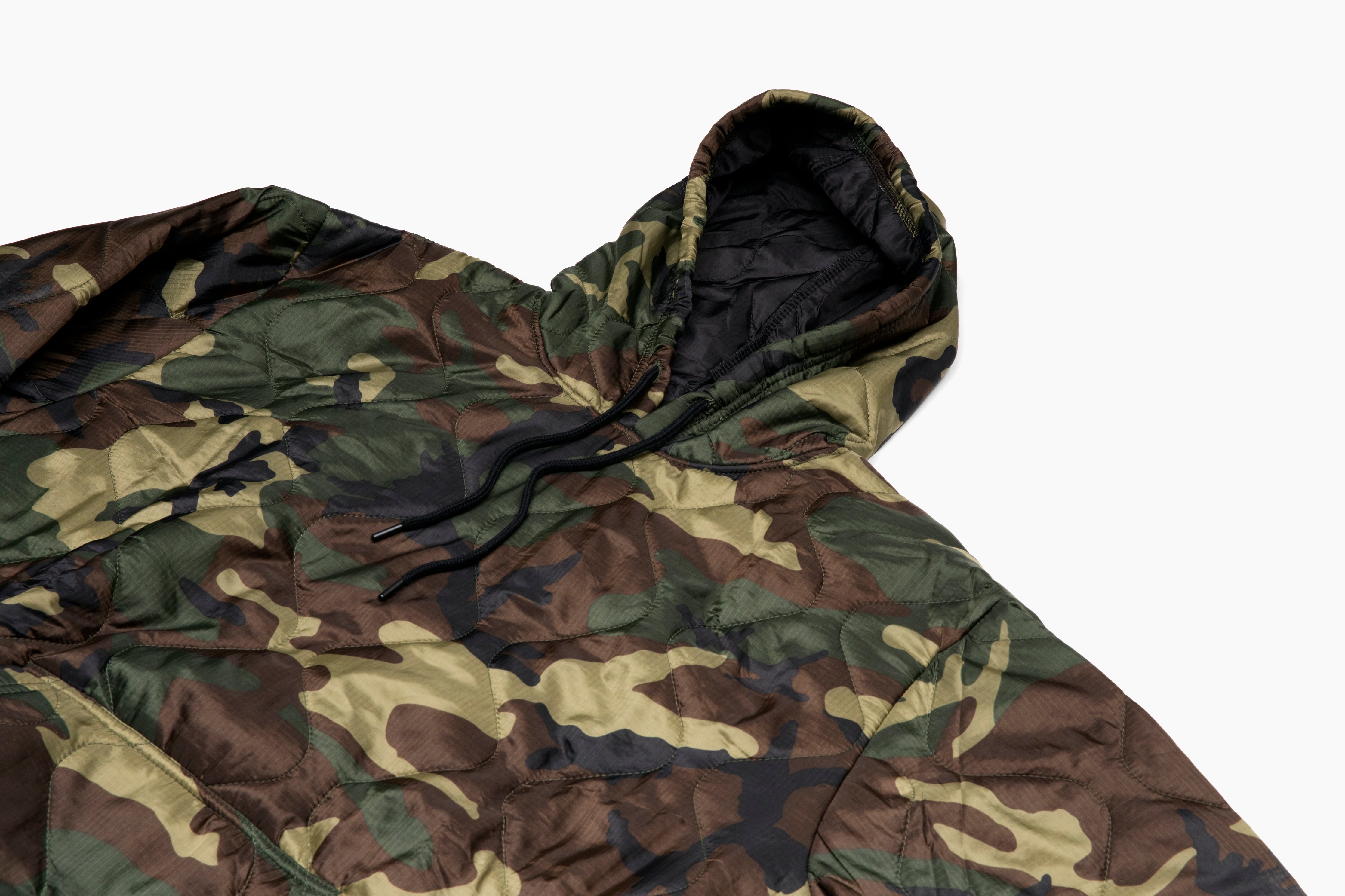 Camouflage quilt on a white background