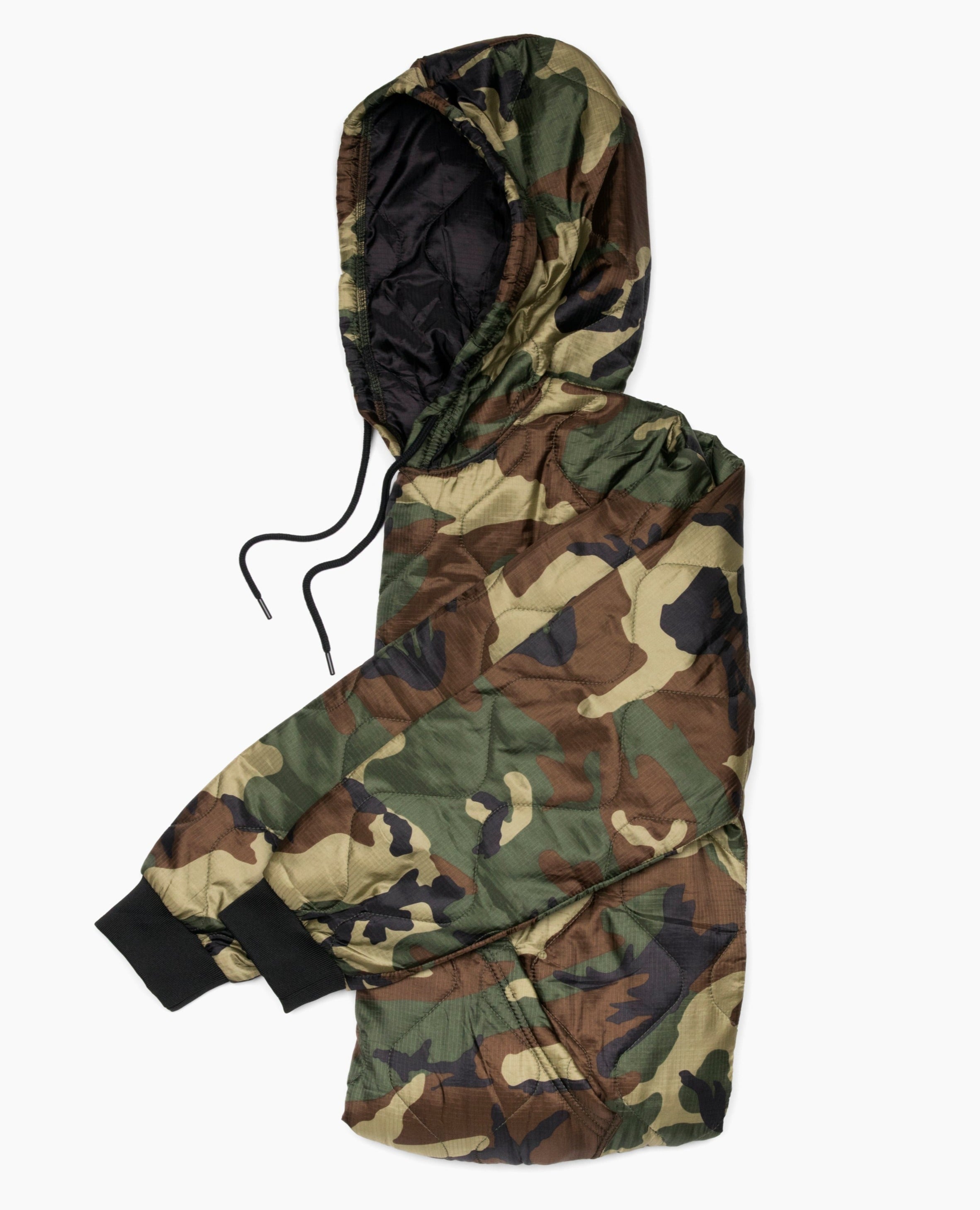 Camouflage-patterned hooded jacket on a white background