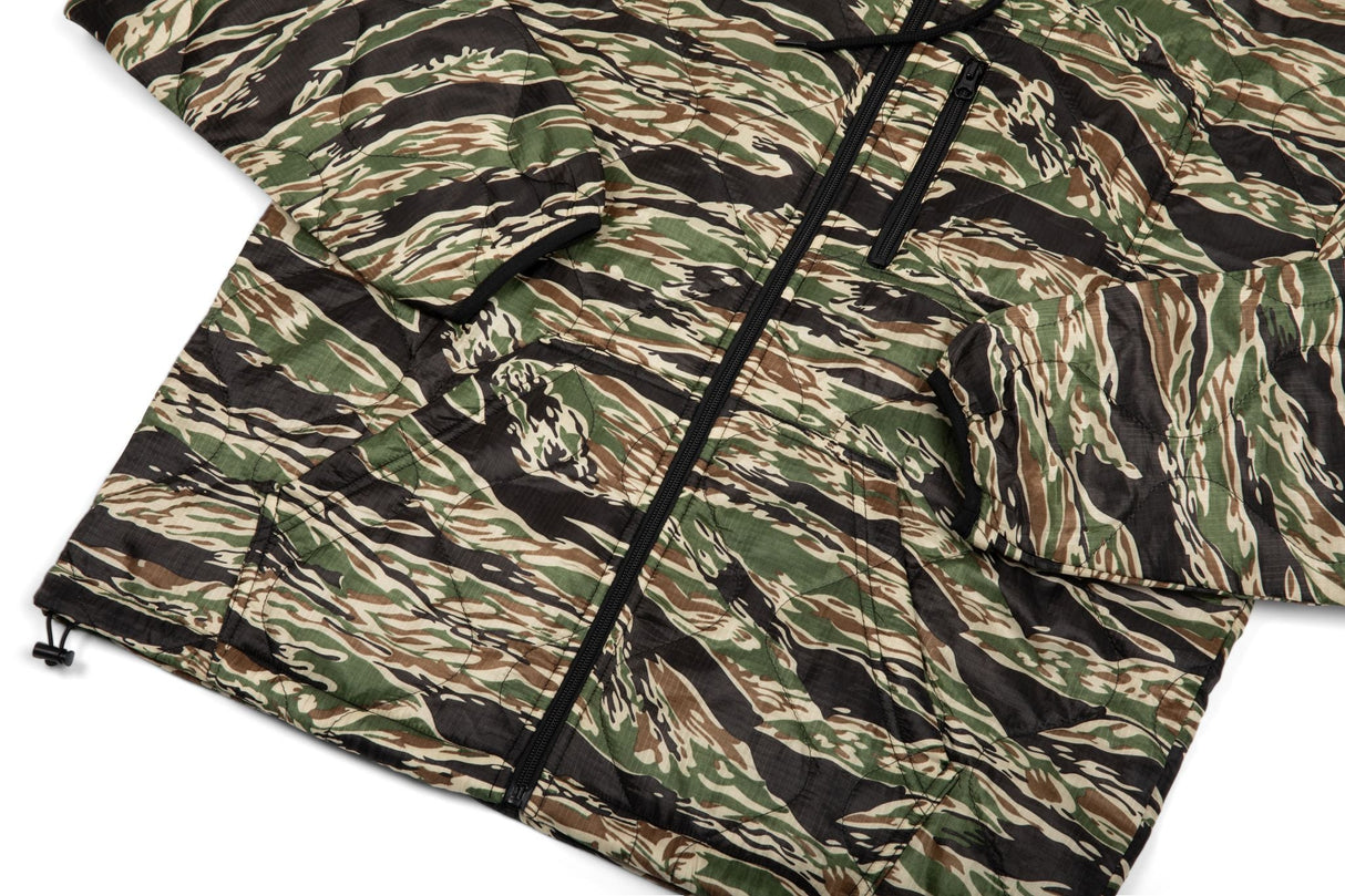 Camouflage-patterned mat on a white background