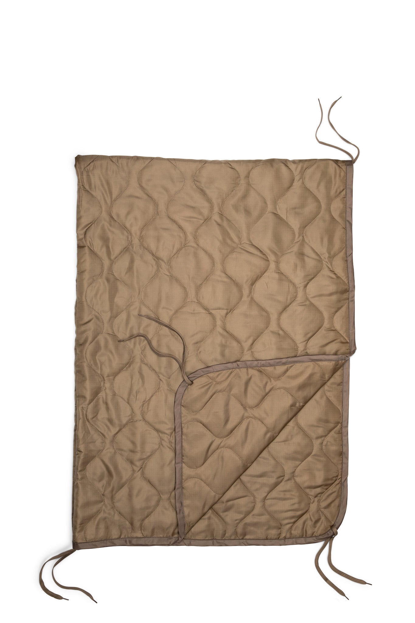 Brown quilted blanket with a textured pattern on a white background