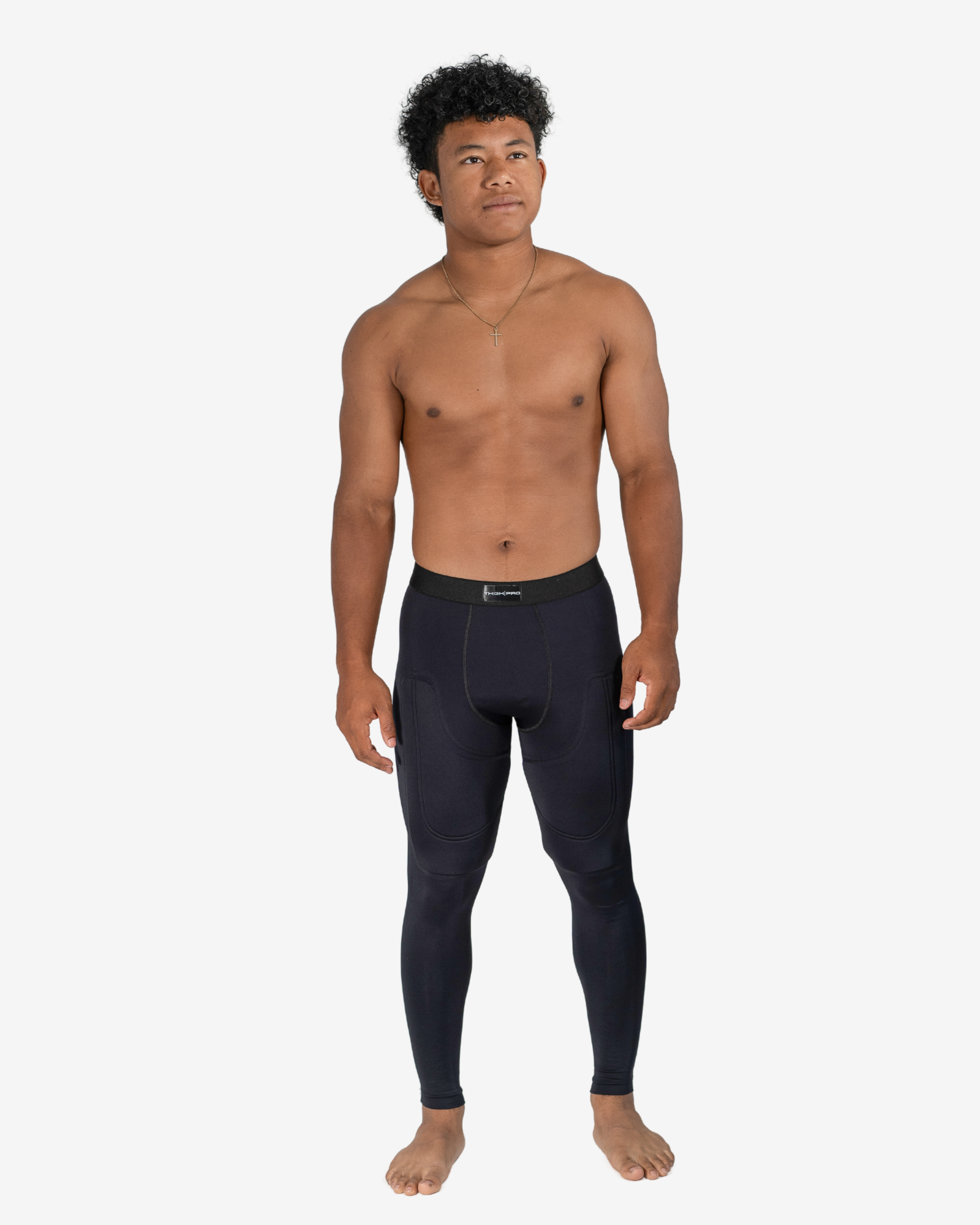 Man wearing black leggings on a white background