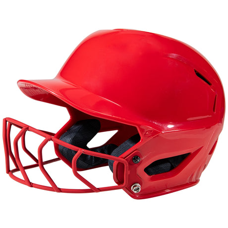 Red softball helmet with face guard on a white background