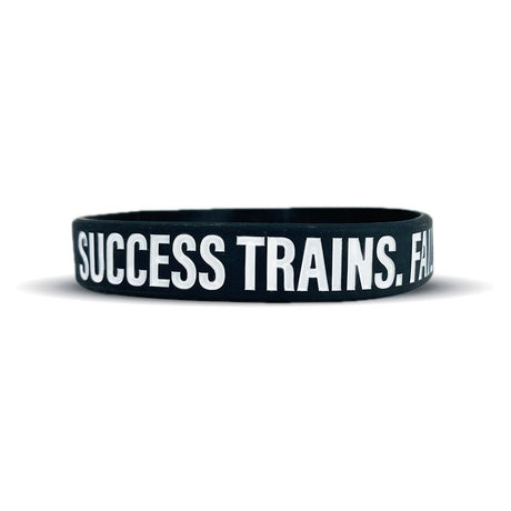 SUCCESS TRAINS. FAILURE COMPLAINS. Wristband - Pro Game Sports