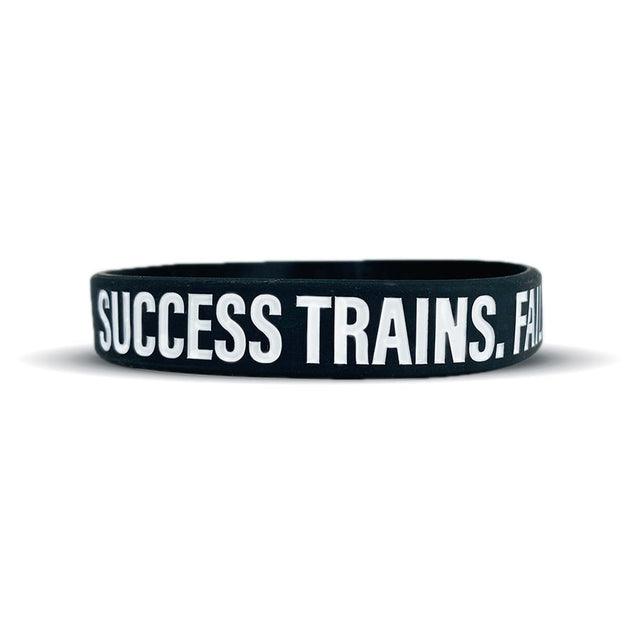 SUCCESS TRAINS. FAILURE COMPLAINS. Wristband - Pro Game Sports