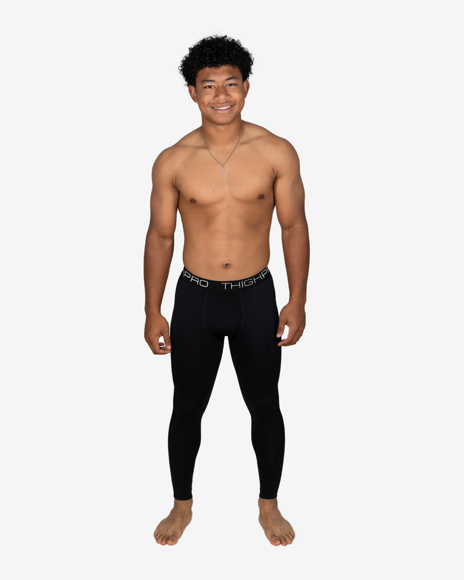 Man wearing black leggings on a white background