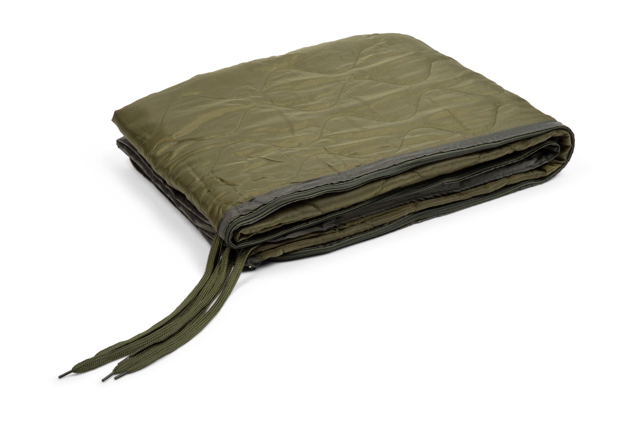 Folded green quilt on a white background