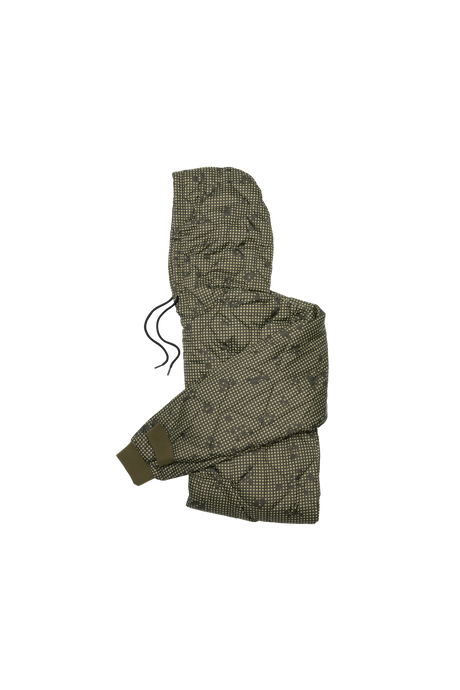 Green quilted jacket with pattern on a white background