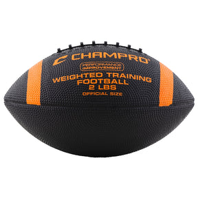 A black and orange weighted training football with the CHAMPPRO brand logo and text indicating it is a 2 lb. ball designed for weighted training.
